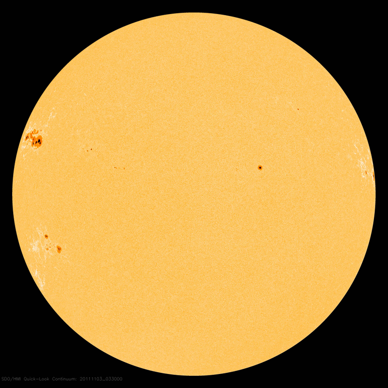 Illustration for article titled Massive new sunspot is three times as wide as the Earth